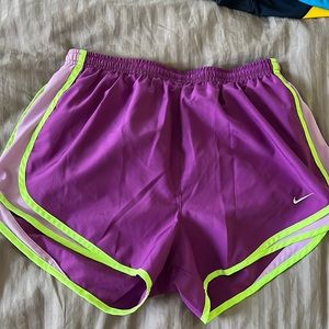 Purple Nike Dri-Fit shorts.